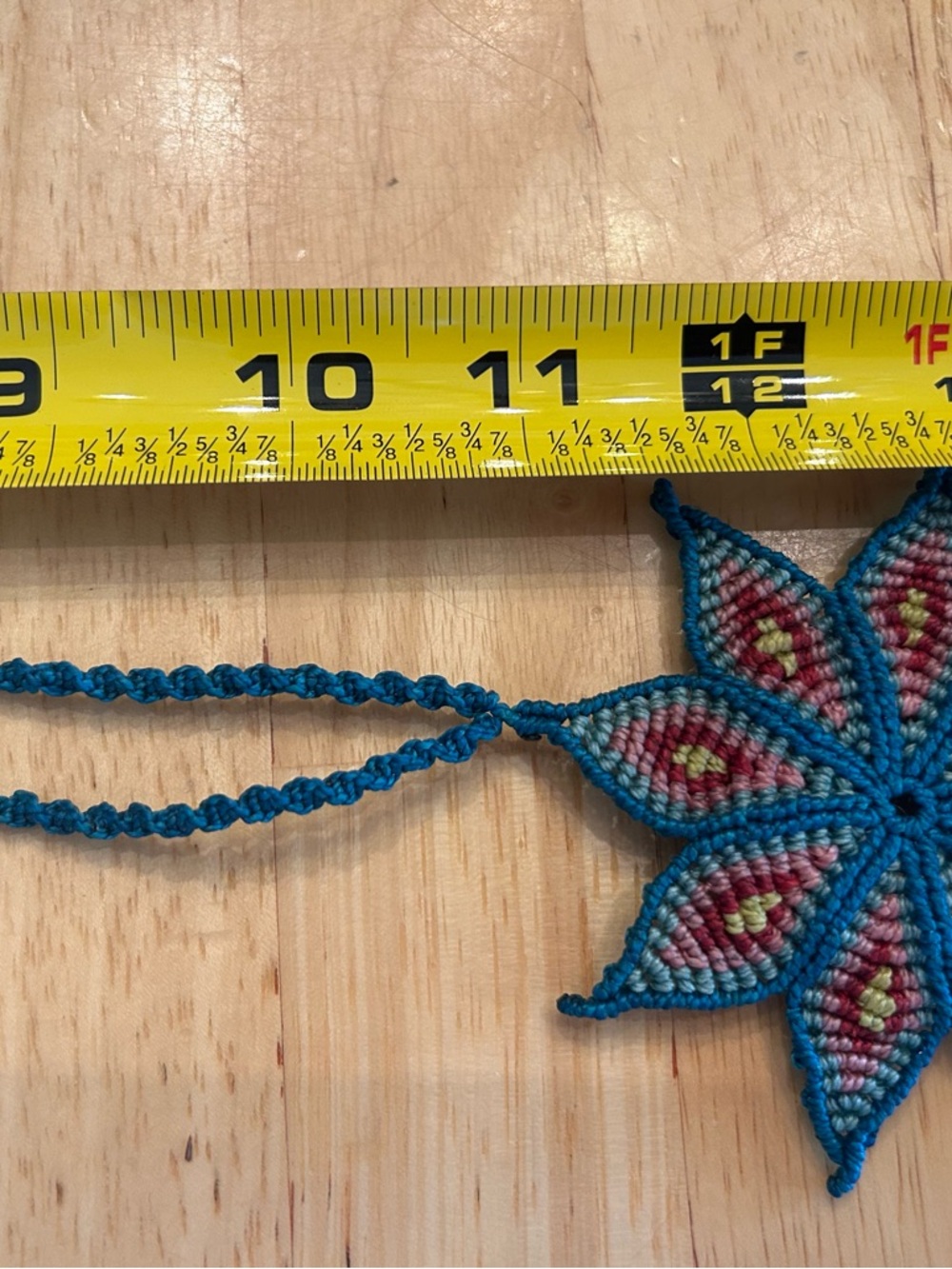 Handmade Rich Blue Macrame Flower Necklace with Red and Yellow Accents - Picture 4 of 6